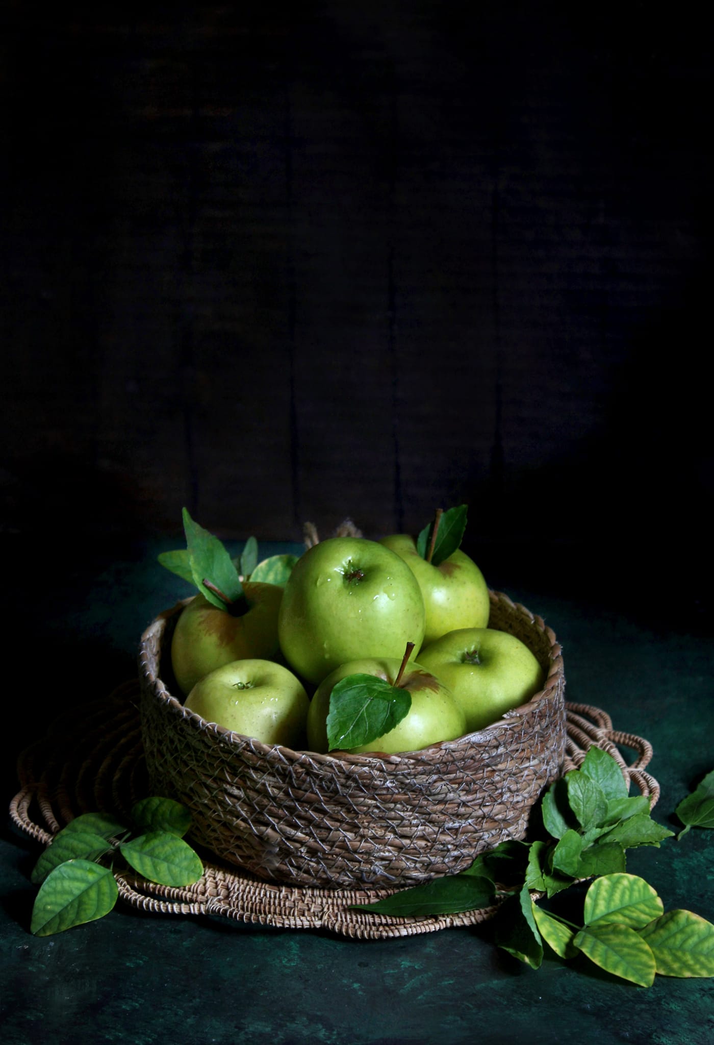 Straw basket with apples